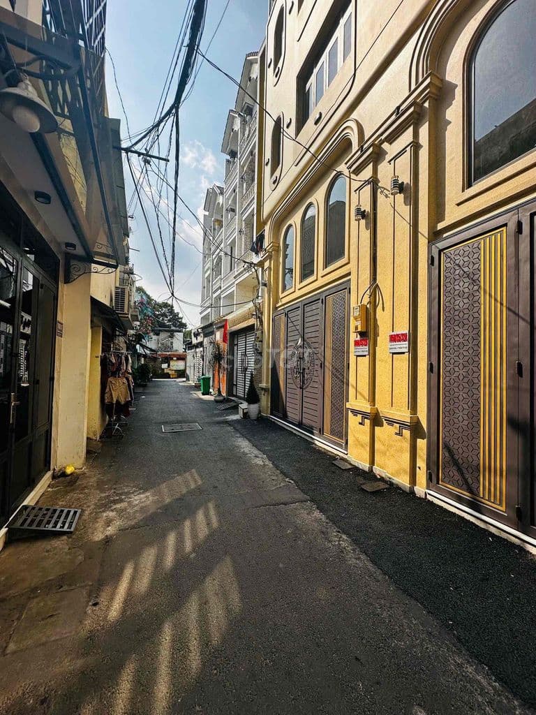 Bán Nhà Mới. 3.05 dài 9. trệt lầu. Quang Trung. hẻm 4m. 2.69tỷ