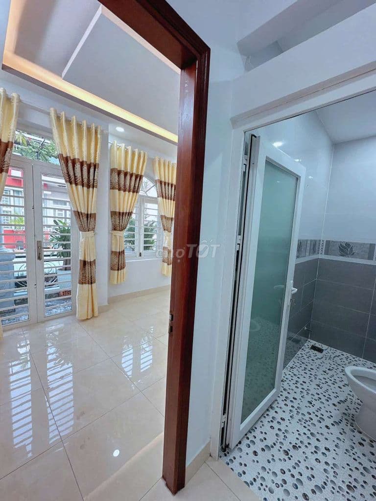 Nhà 4 Tầng 40m2 Hẻm xe hơi 7m Thông Sát Mặt Tiền Gò xoài
