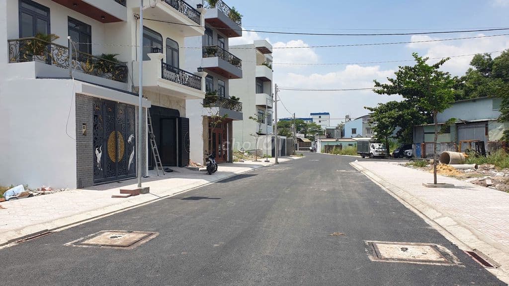 Đất full thổ DT 7.5m*12m, đường 14m gần chợ Hóc Môn, sổ hồng riêng - Ảnh 2