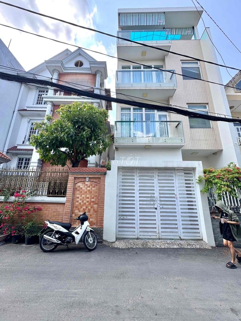 NGAY CHỢ AN NHƠN. NHÀ KHỦNG 4 TẦNG. 6,5x14. OTO NGỦ NHÀ. HƠN 100TR/M - Ảnh 2