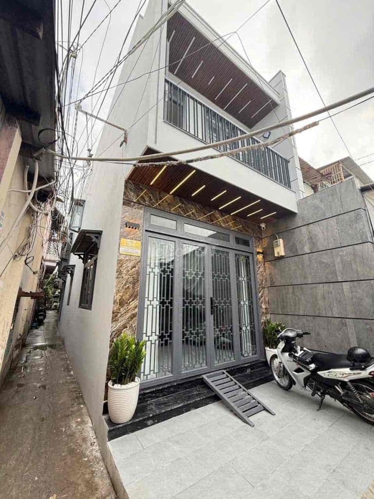 NHÀ PHỐ VỪA Ở VỪA KINH DOANH NGAY CHỢ TÂN QUY QUẬN 7 - SỔ HỒNG RIÊNG