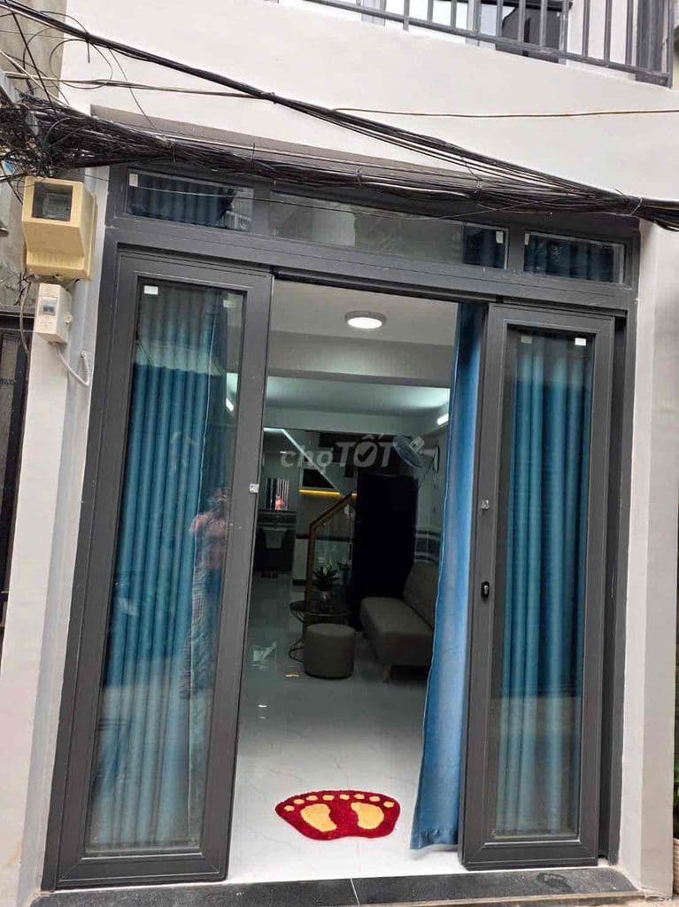 Nhà Quận 7 sổ hồng riêng gồm 4 phòng ngủ 3 tầng. - Ảnh 2