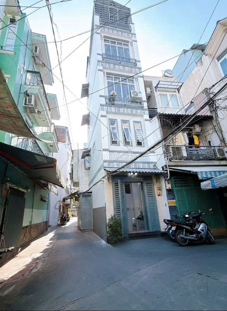Mua bán nhà quận 4, 5 tầng hoàn công, dân cư hiện hữu, hẻm thông 5m !