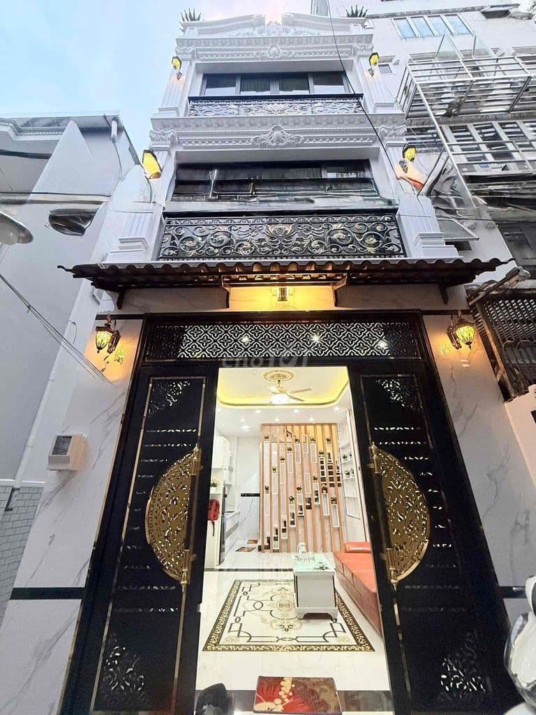 nhà 4 lầu cao cấp thiết kế cổ điển HXH 120/29/48 Thích Quảng Đức