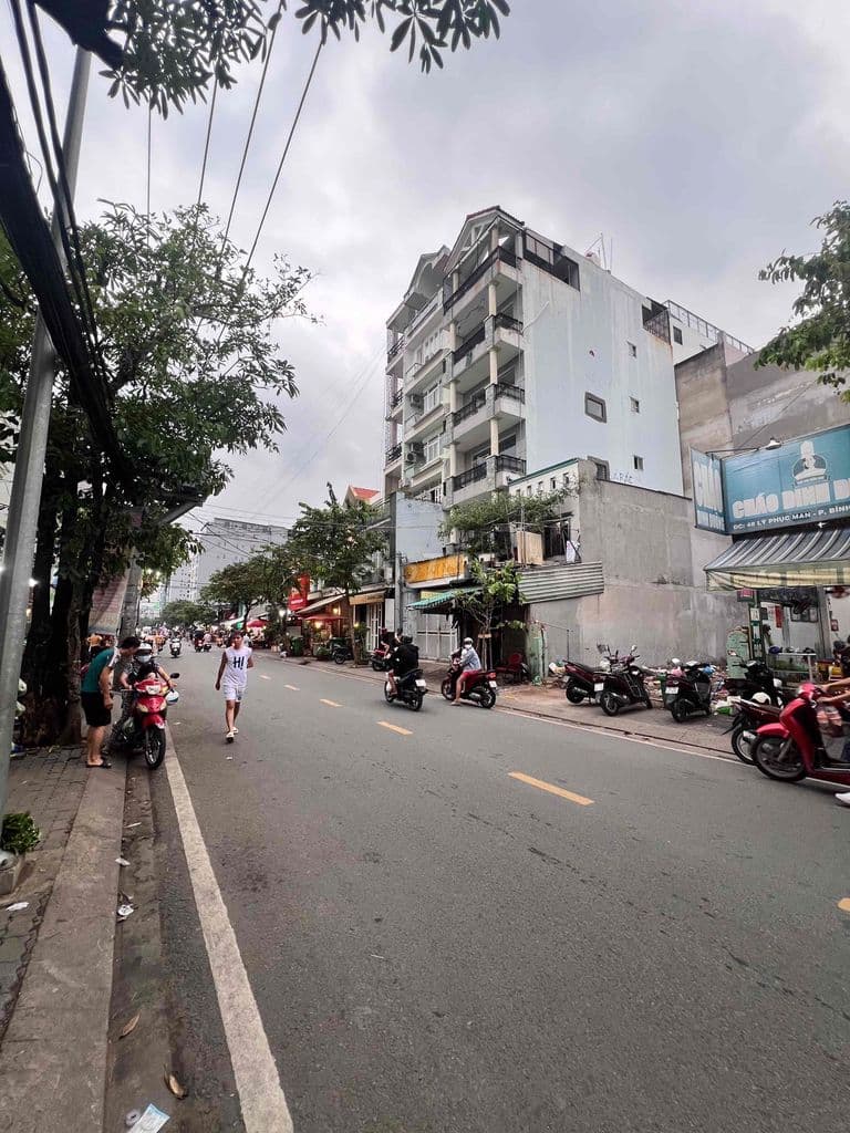 BÁN CĂN NHÀ 6 LẦU MẶT TIỀN ĐƯỜNG LÝ PHỤC MAN QUẬN7 - Ảnh 2