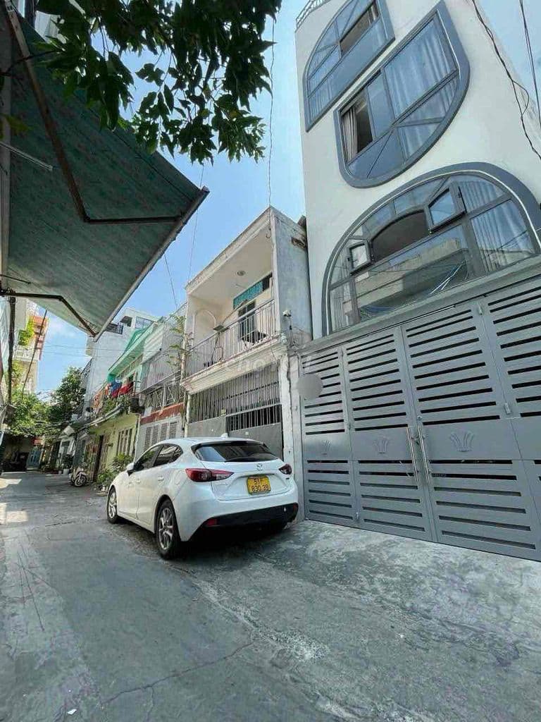 Bán nhà mới 4 tầng hẻm xe hơi Nguyễn Xí, đoạn 2 chiều kế Vincom