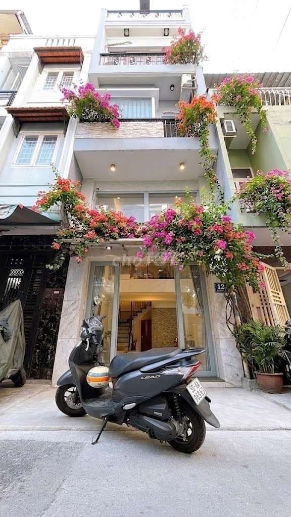 Mua bán nhà quận 4, 5 Tầng hoàn công, đường số 6m xe hơi, Tân Vĩnh !