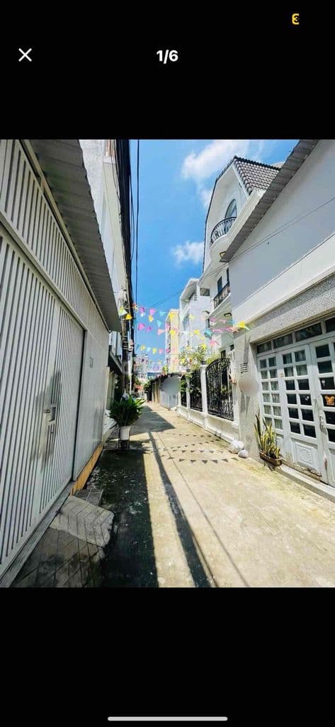 nhà 3 tầng 52m2 hẻm xe hơi sát mặt tiền dân trí cao chủ đi định cư