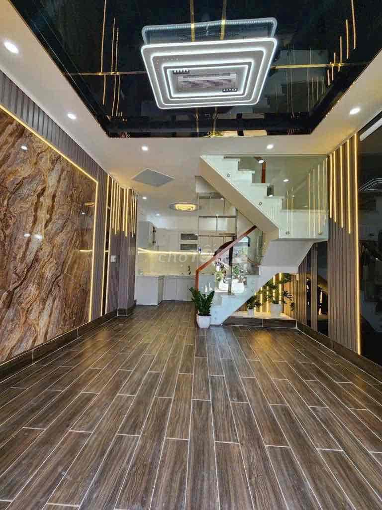 Nhà 2 lầu 4 phòng ngủ lê văn lương ngay cầu ông bốn