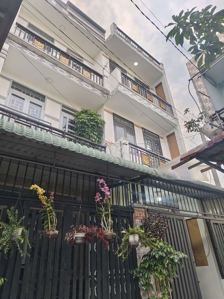 nhà 2 lầu đúc kiên cố ấp 3 xtt gần chợ đầu mối