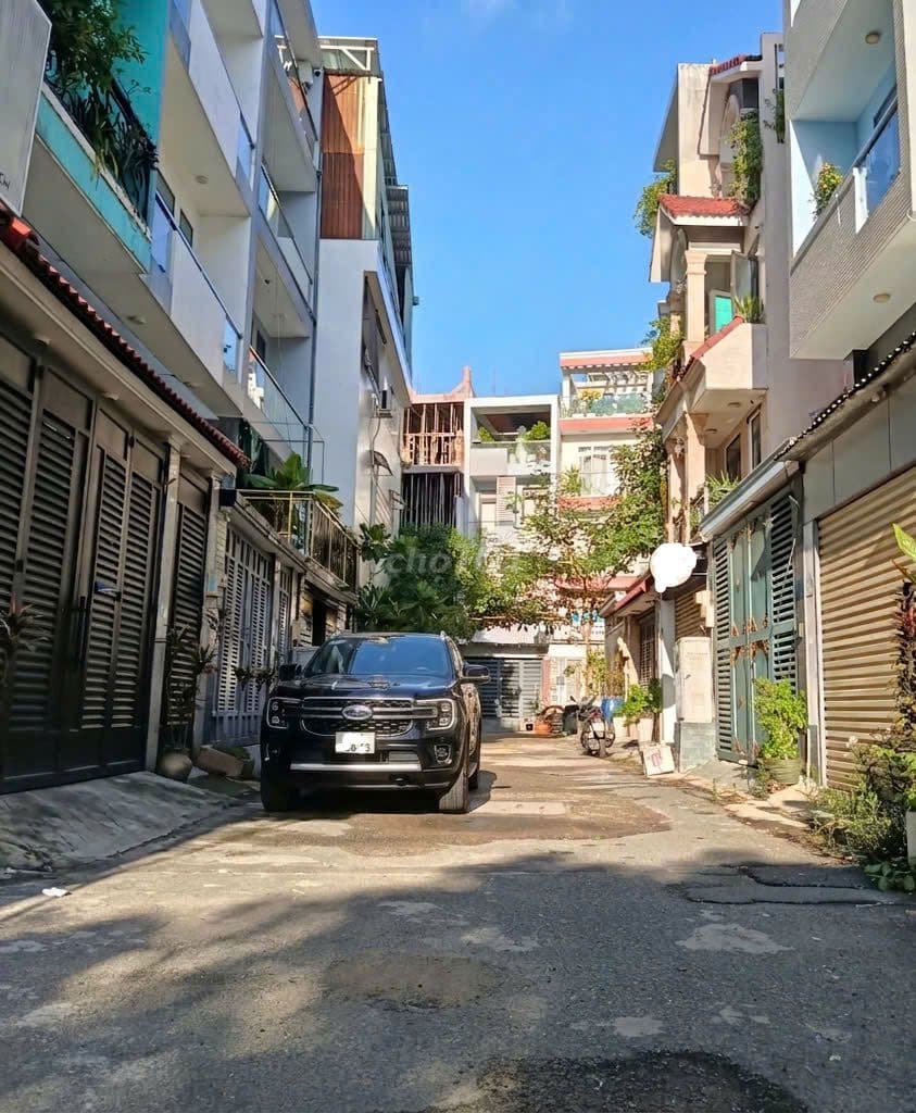 BÁN RẤT GẤP - 4 Tầng Nhà đẹp, Hẻm 2 XE HƠI thông ra Dương Quảng Hàm