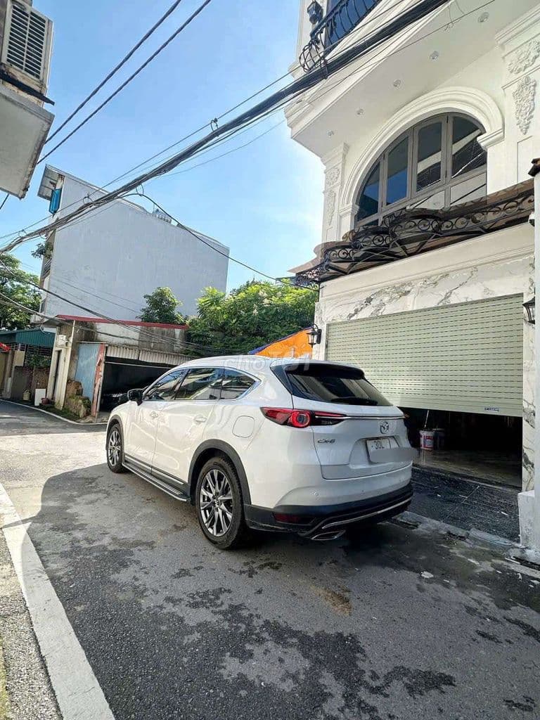 Cần bán nhà lô góc 8 tầng thang máy ngõ thông ô tô vào nhà 4 phòng ngủ