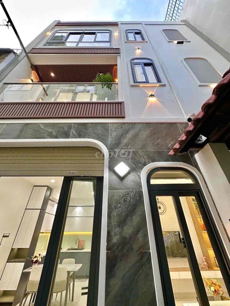 Nhà ngang khủng 6.5m – 4 tầng hiện đại | Nơ Trang Long - 5.6 tỷ