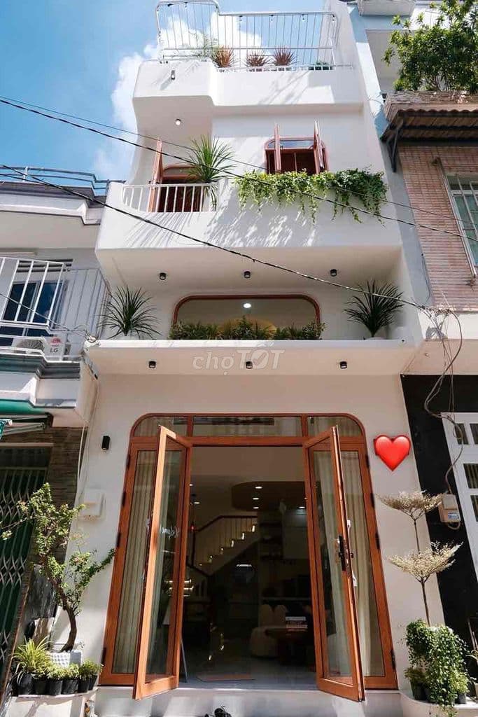 nhà mới xây phong cách hiện đại wabi sabi hẻm 6m oto