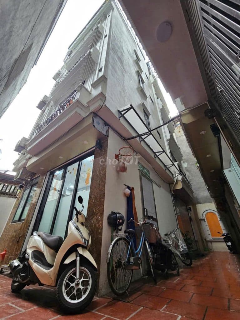Bán Nhà Ngõ 6 Cầu Tó 40m2 xây 5 tầng lô góc ô tô 5ty