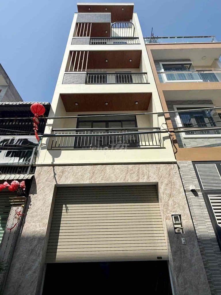 NHÀ 4 TẦNG - HẺM 488 LÃ XUÂN OAI CẠNH ĐH TÀI CHÍNH