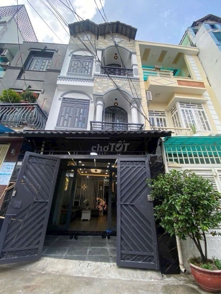 Nhà phố trệt 2 lầu. Mặt tiền hẻm chính, oto đỗ cửa tại Thị Trấn NB