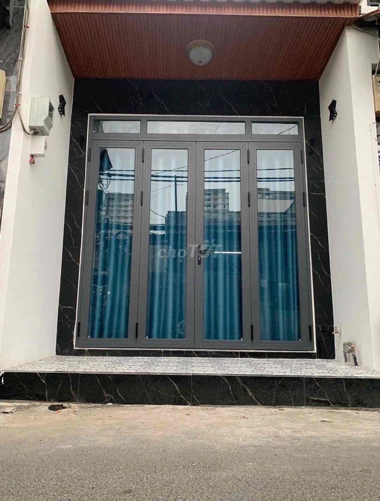 Tôi bán nhà 60 m2, 1 trệt. 1 lầu. Ôtô đậu trước nhà. Tuyệt đẹp. Quận 7