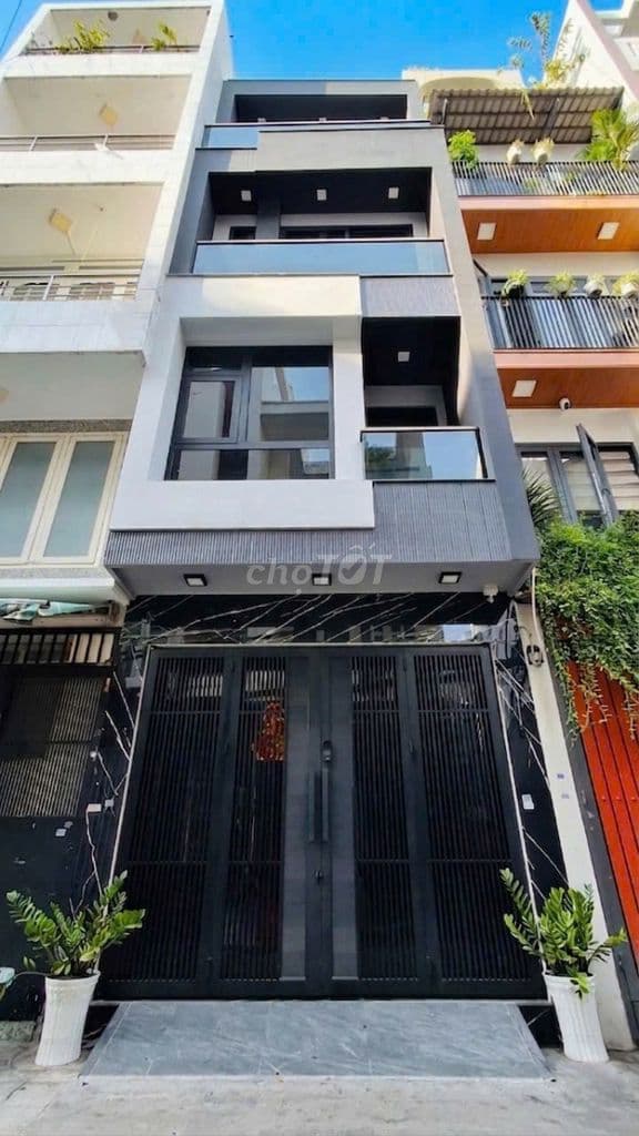 Xe hơi trước nhà Huỳnh Văn Bánh, 5Tầng,3PN,Vuông vức,ngay Lê V Sỹ
