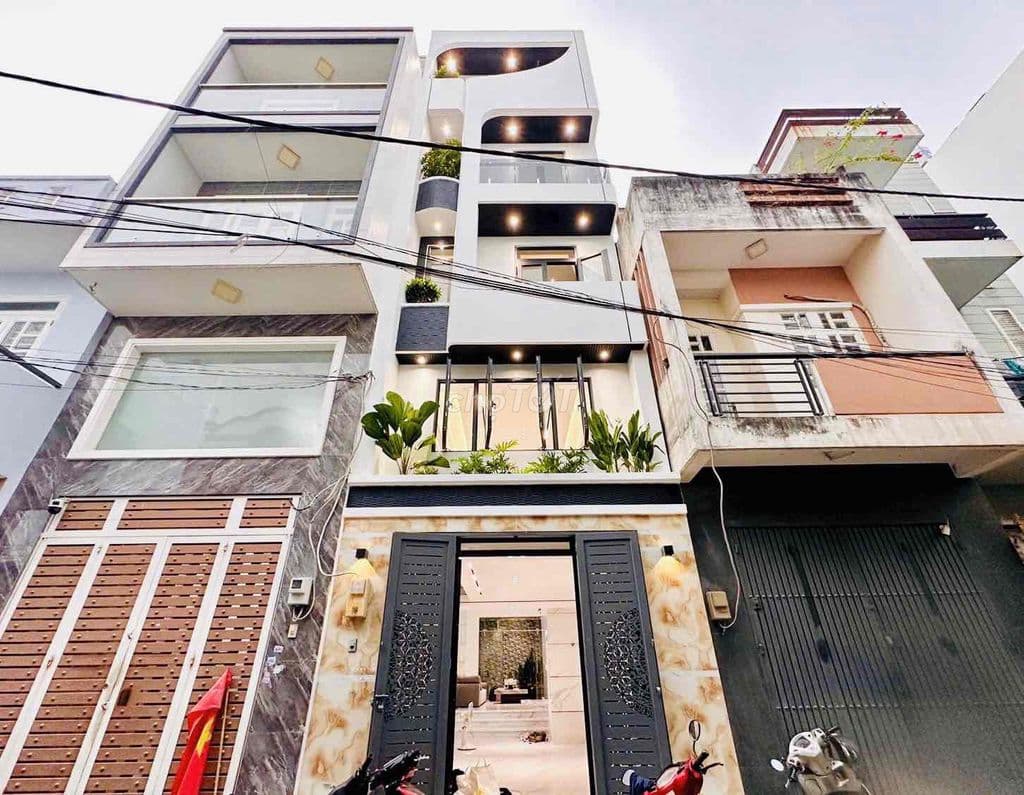 Nhà đẹp 4x14.1m 1 trệt lửng 3 lầu 5PN 6WC HXH Lê Văn Quới - Giá 8.95ty