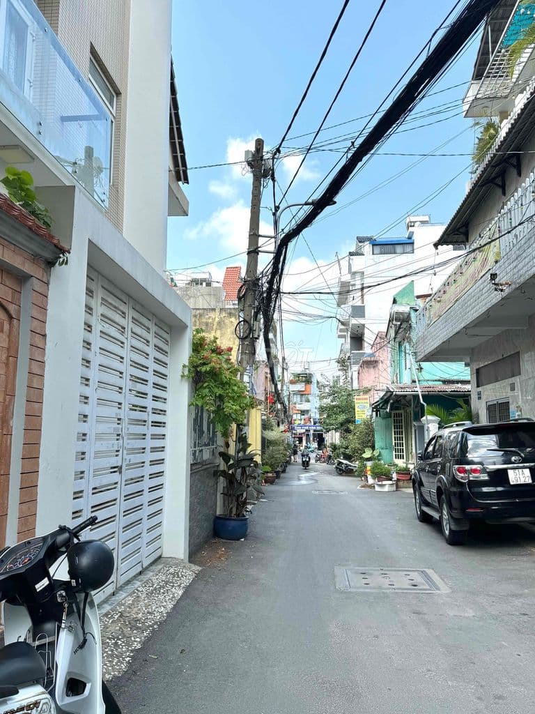 NGAY CHỢ AN NHƠN. NHÀ KHỦNG 4 TẦNG. 6,5x14. OTO NGỦ NHÀ. HƠN 100TR/M - Ảnh 3