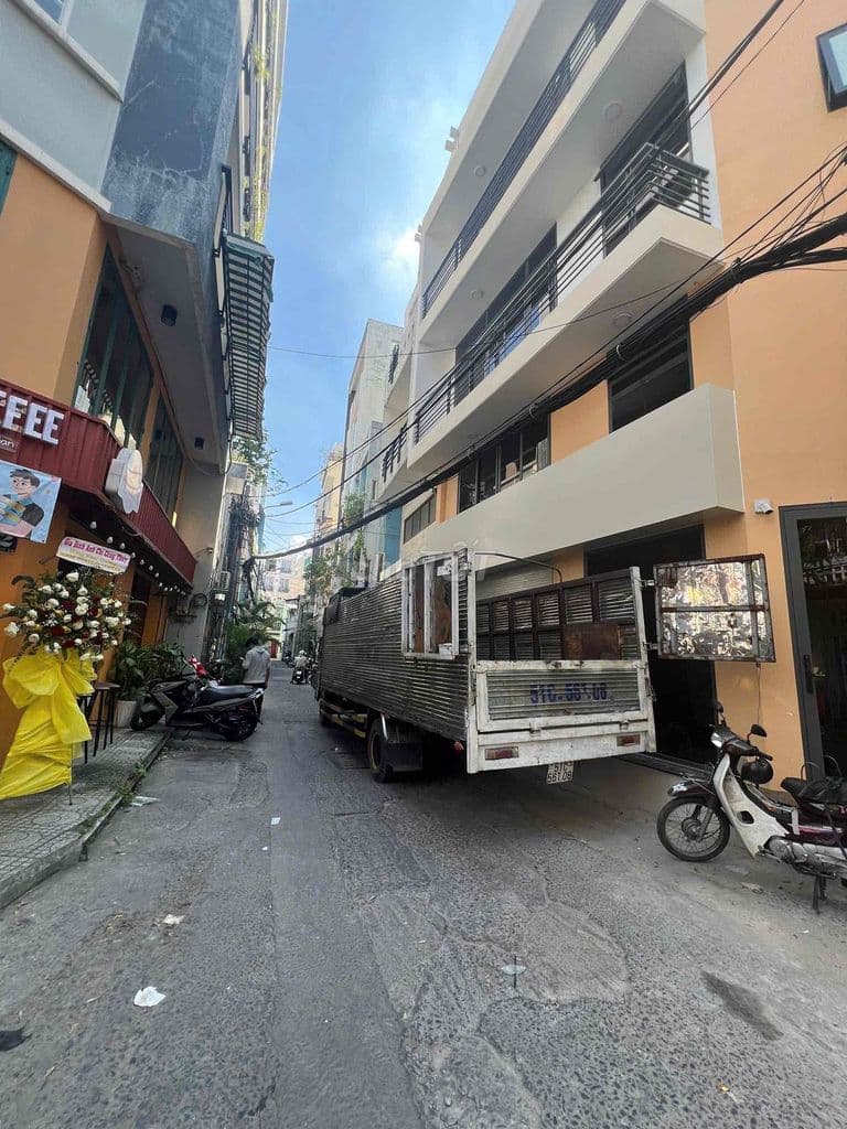 tôi cần bán căn nhà hẻm xe hơi phan xích long 5tỷ9