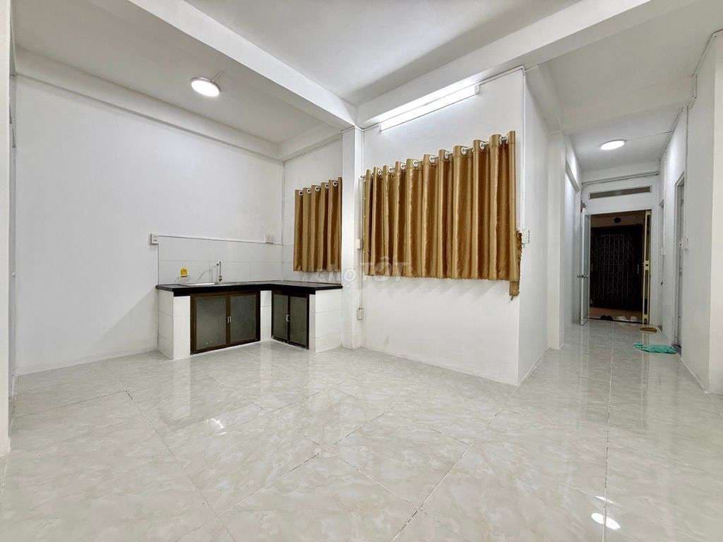 Căn hộ lầu 1 giáp Bình Thạnh ,ngang 6 hiếm ,sổ hồng riêng,giá