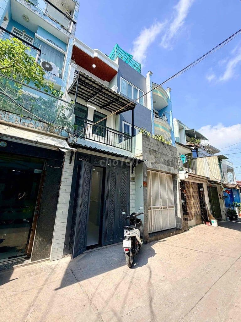 Nhà hẻm xe hơi 166 Nguyễn Duy 2 lầu - Ảnh 2