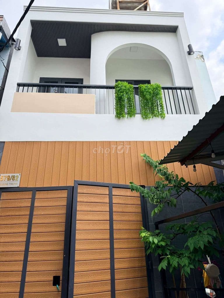 nhà 4,1 x 8 nở hậu 5m đúc 1 trệt 1 lầu đường Quang Trung P11 gò vấp