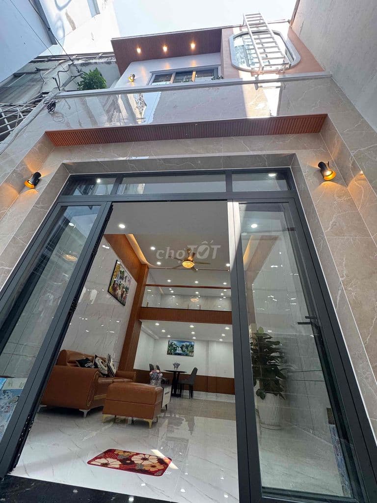 Cần Bán căn Nhà ngay đối dien với cổng Trường Phan Tây Hồ , DT 55 m2