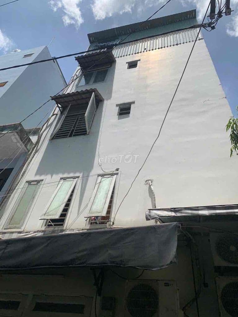 nhà bán Tân Phú trệt 4 lầu sân thượng 4 phòng ngủ hẻm ô tô cách mt 1 c