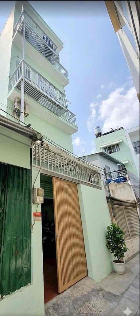 BÁN CĂN NHÀ 1 TRỆT 1 LỬNG 2 LẦU SÂN THƯỢNG QUẬN7
