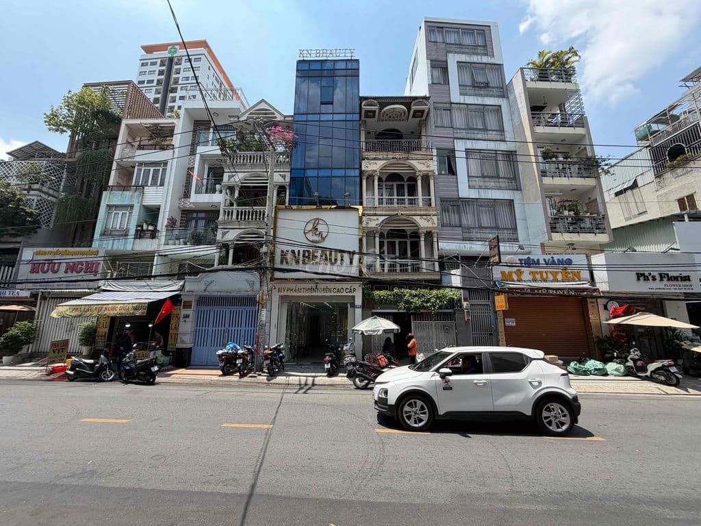 NHÀ MẶT TIỀN 5LẦU ĐƯỜNG NGUYỄN VĂN THƯƠNG, P25 ,BT. Đoạn KD Sầm Uất.