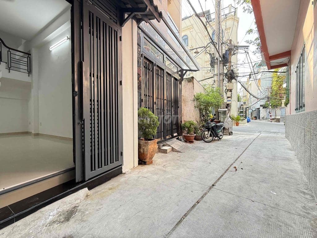 Nhà hẻm xe hơi Phan Văn Trị, 46m2 có phòng ngủ tầng trệt - Ảnh 2