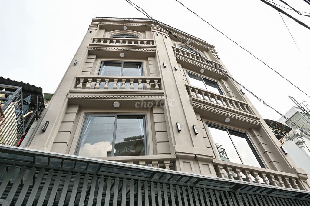 Bán cặp nhà xây mới 100% sát MT Quang Trung P10