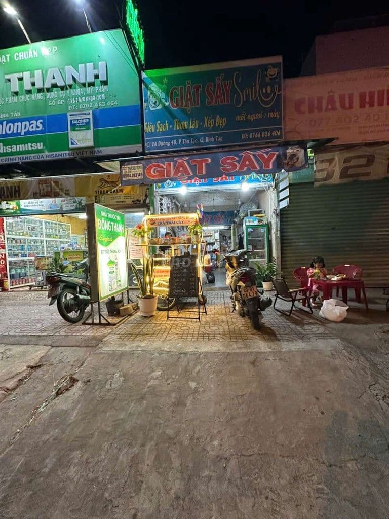 Cần Sang Gấp Giặt Ủi Và Xe Cafe MiNi Trước Nhà