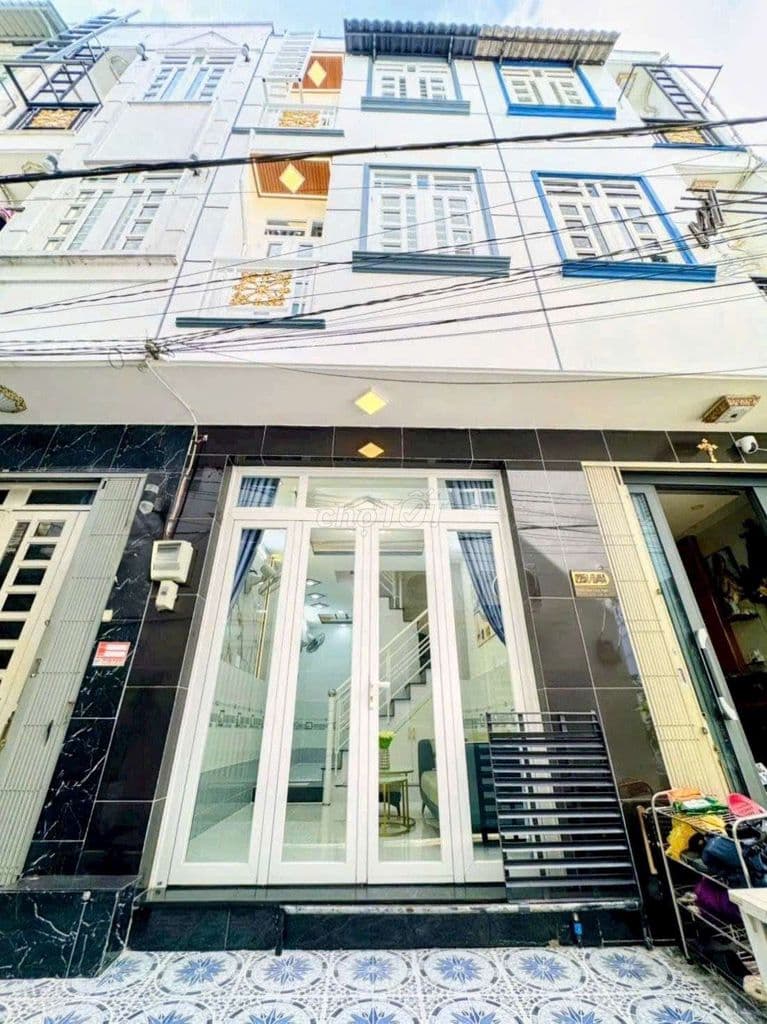 Nhà 2 lầu có sổ hồng cần bán