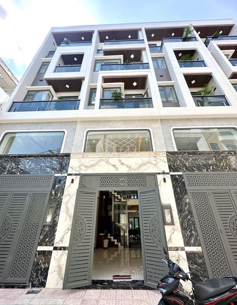 Nhà 4.5 tấm 4x16 thang máy Chiến Lược - Tân Hoà Đông
