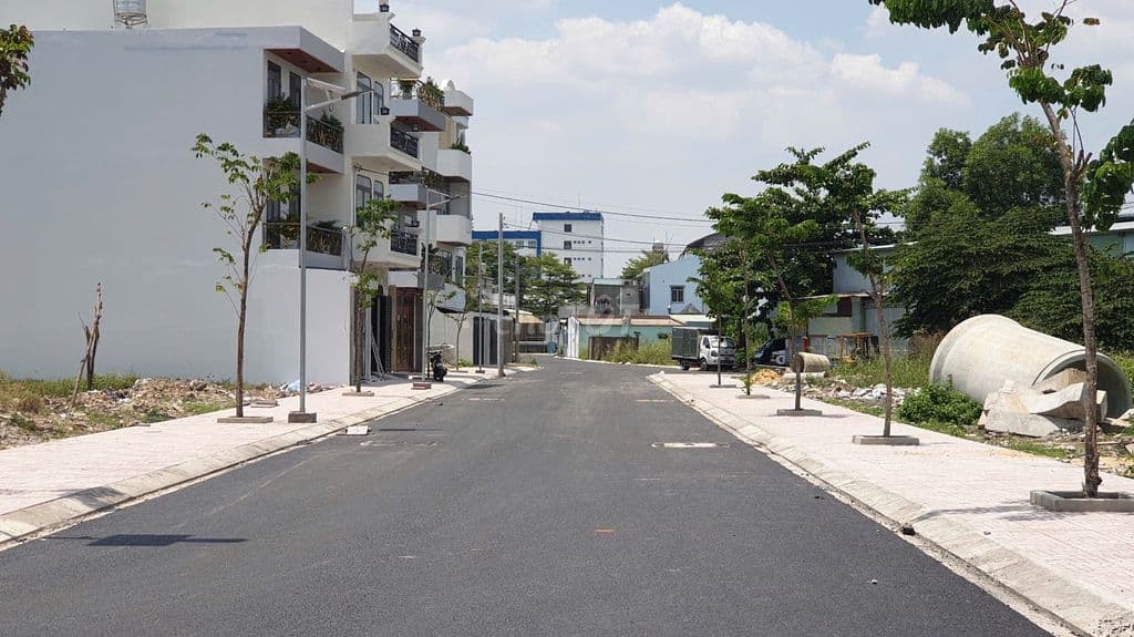 Đất full thổ DT 7.5m*12m, đường 14m gần chợ Hóc Môn, sổ hồng riêng - Ảnh 3